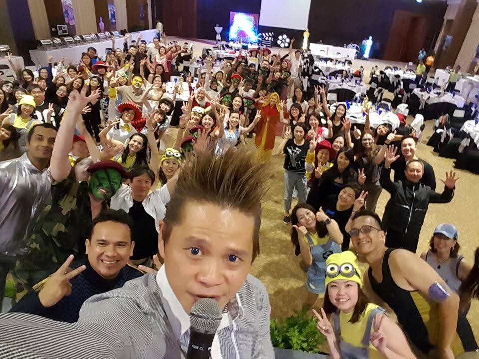 Emcee selfie with crowd at dinner and dance
